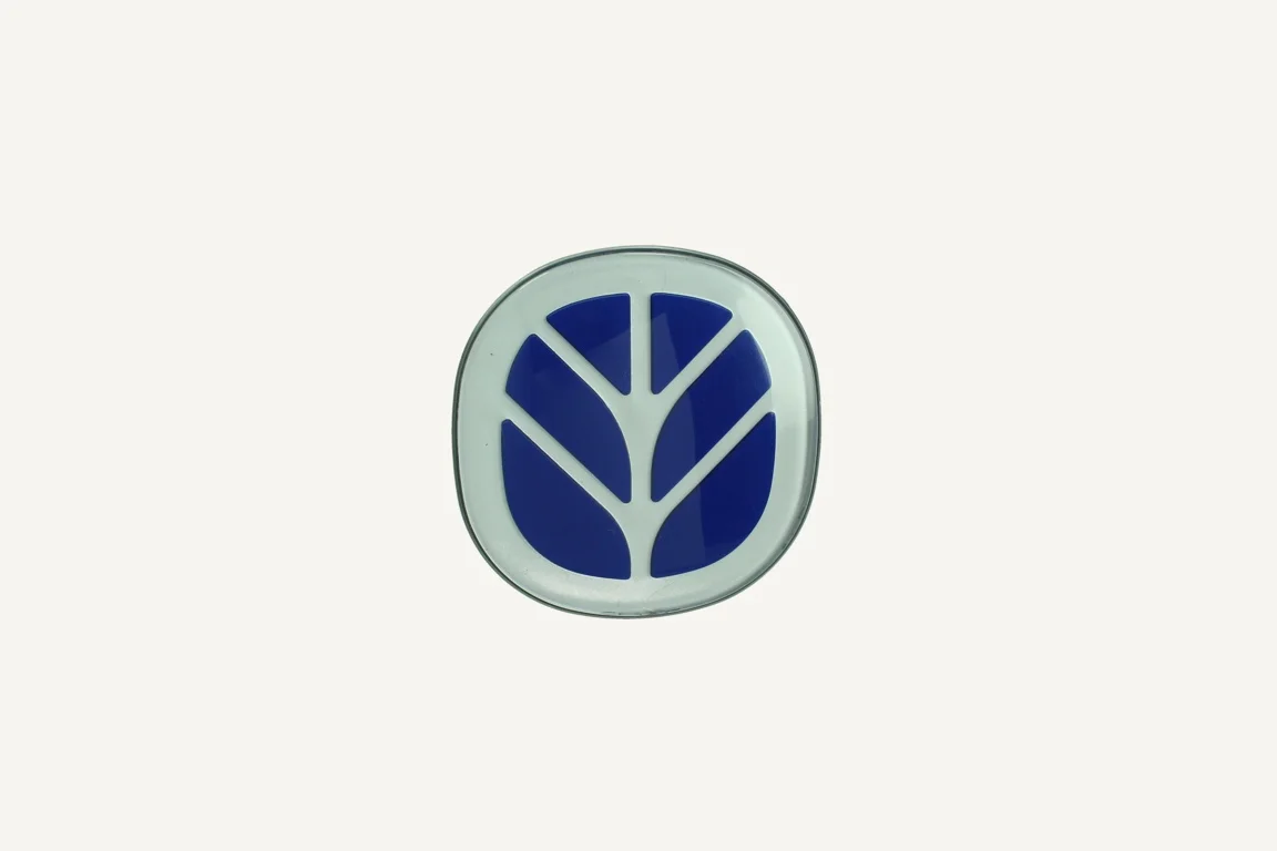 [1011856] Emblem New Holland 85x87mm